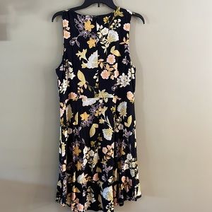 A floral print sleeveless dress from LOFT. Dress is made of rayon/spandex blend.